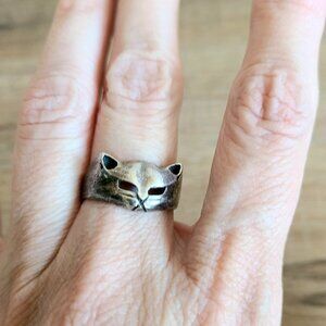 Sterling silver cat or cheetah ring. Stamped 925 silver unisex jewelry.